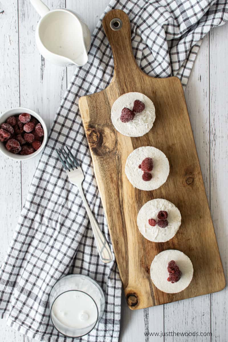 no bake coconut cups on wooden board