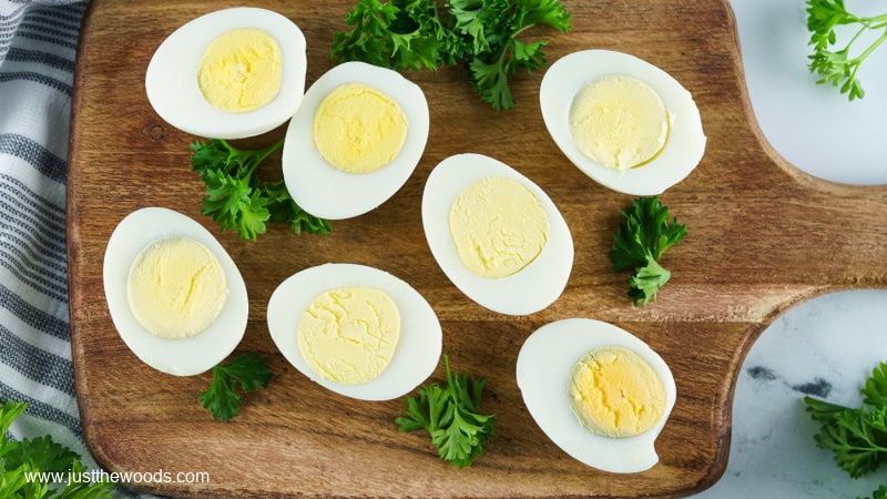 hard boiled eggs on a wood board