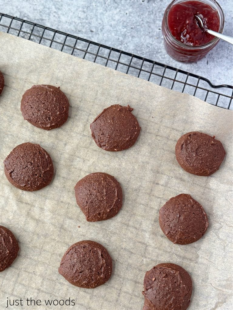 baked Chocolate Gluten Free Thumbprint Cookie Recipe with raspberry Jam