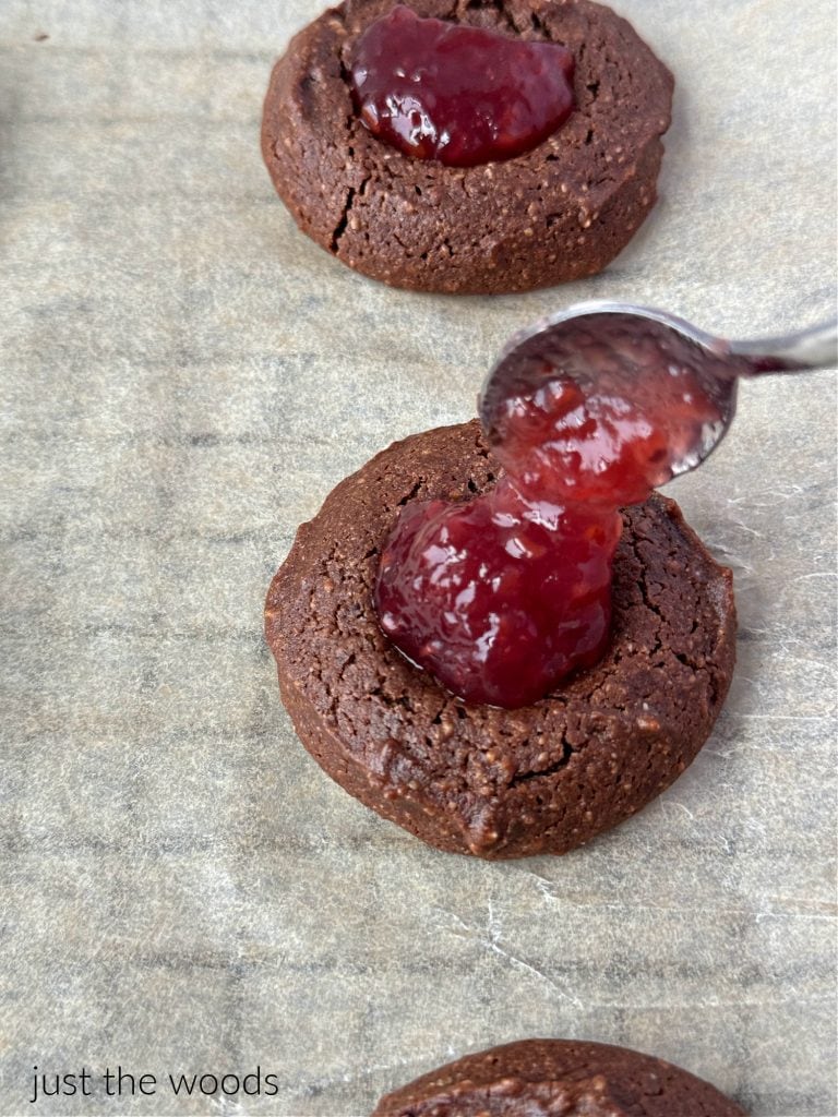 raspberry jam on thumbprint cookies 