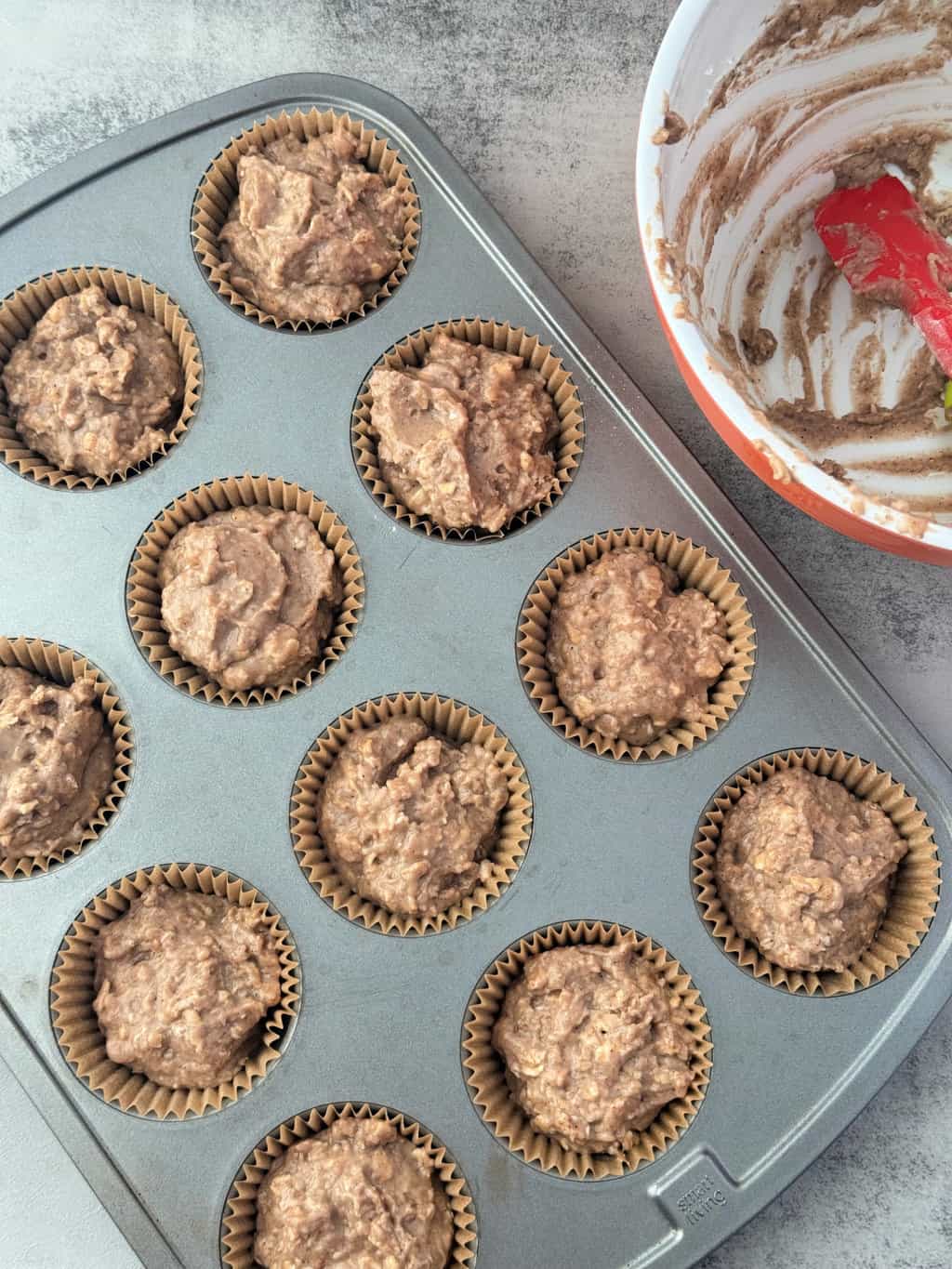 muffin batter in muffin cups