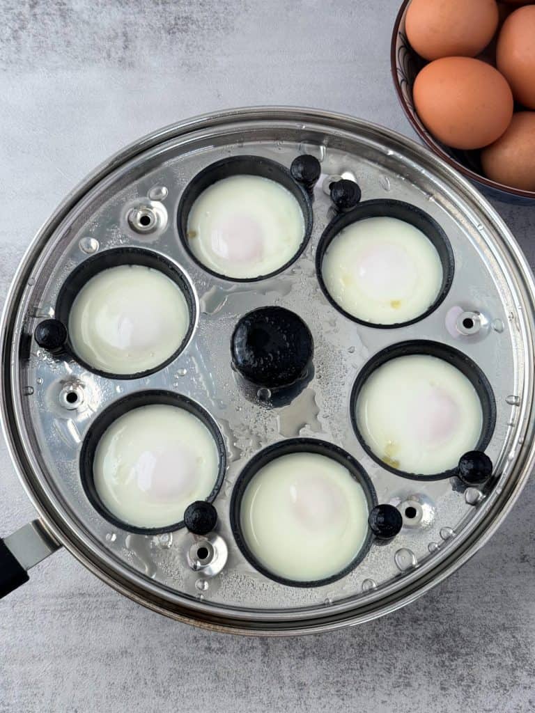 poached eggs in a poacher pan
