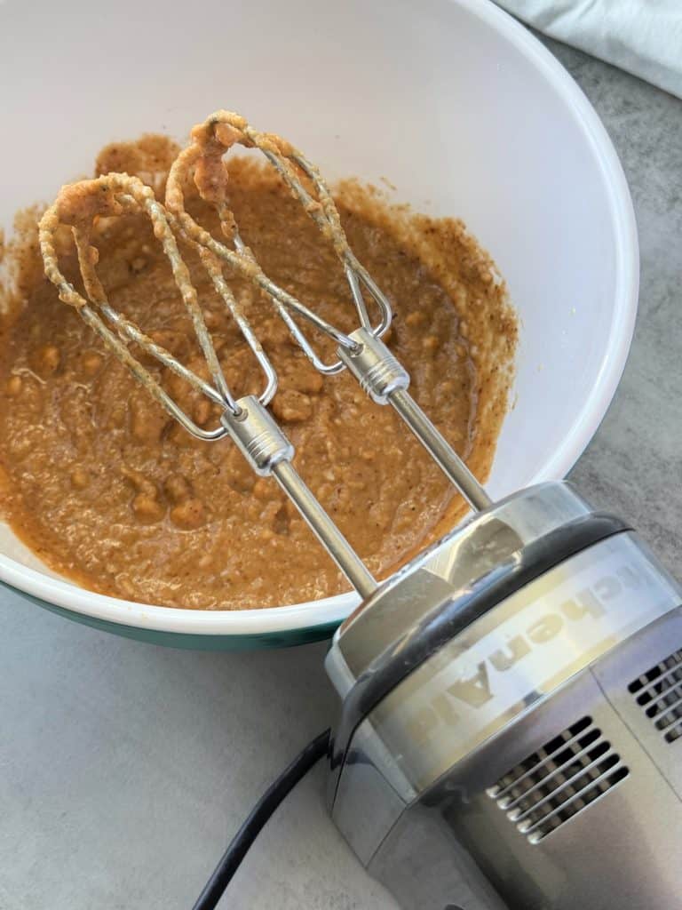 hand mixer to mix muffin batter 