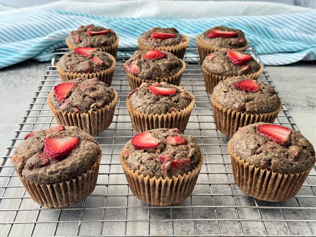 banana strawberry muffins on wire rack