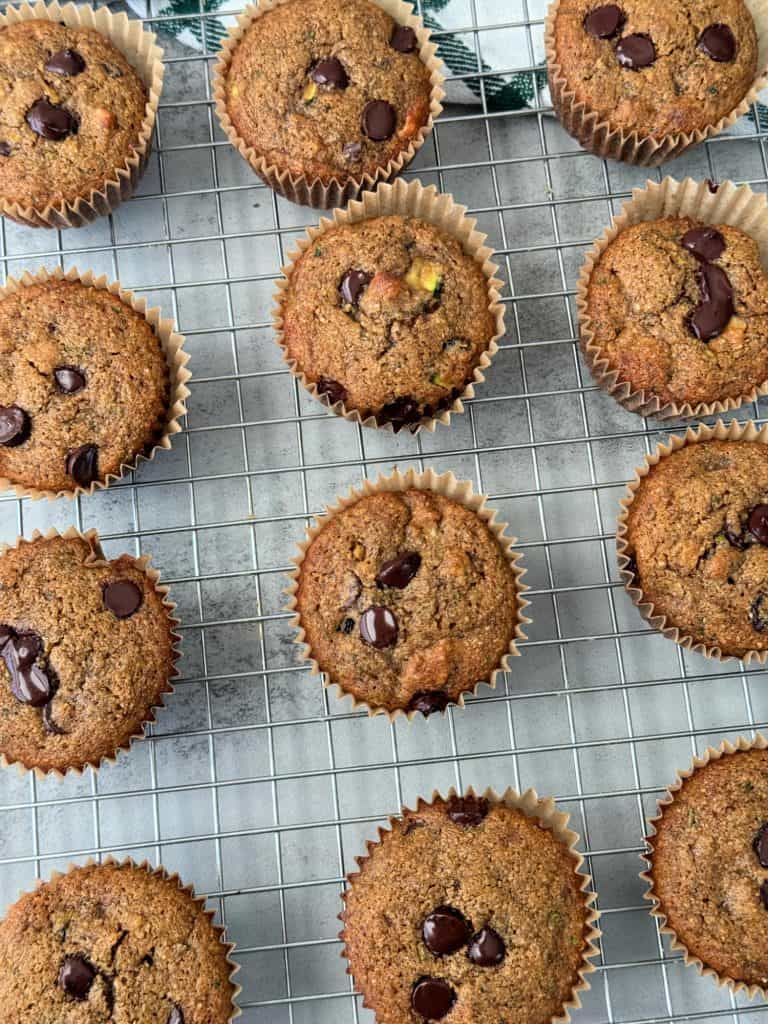 healthy gluten free zucchini muffins on wire rack to cool