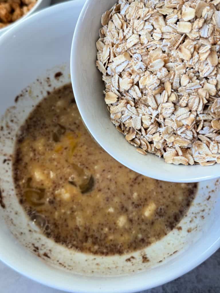 add oats to wet mixture 