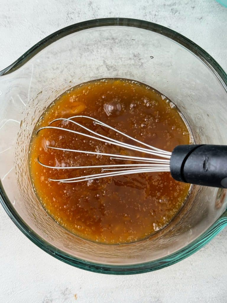 whisk eggs and maple syrup 