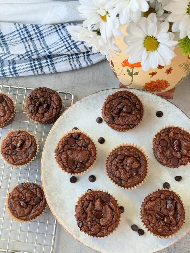 top view of pumpkin chocolate muffins on platter 