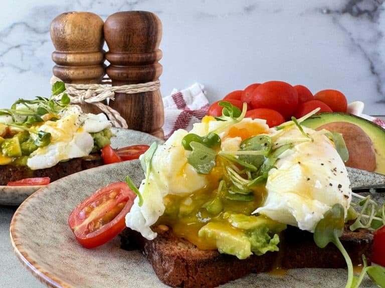 Poached Eggs Recipe on Avocado Toast with Tomatoes