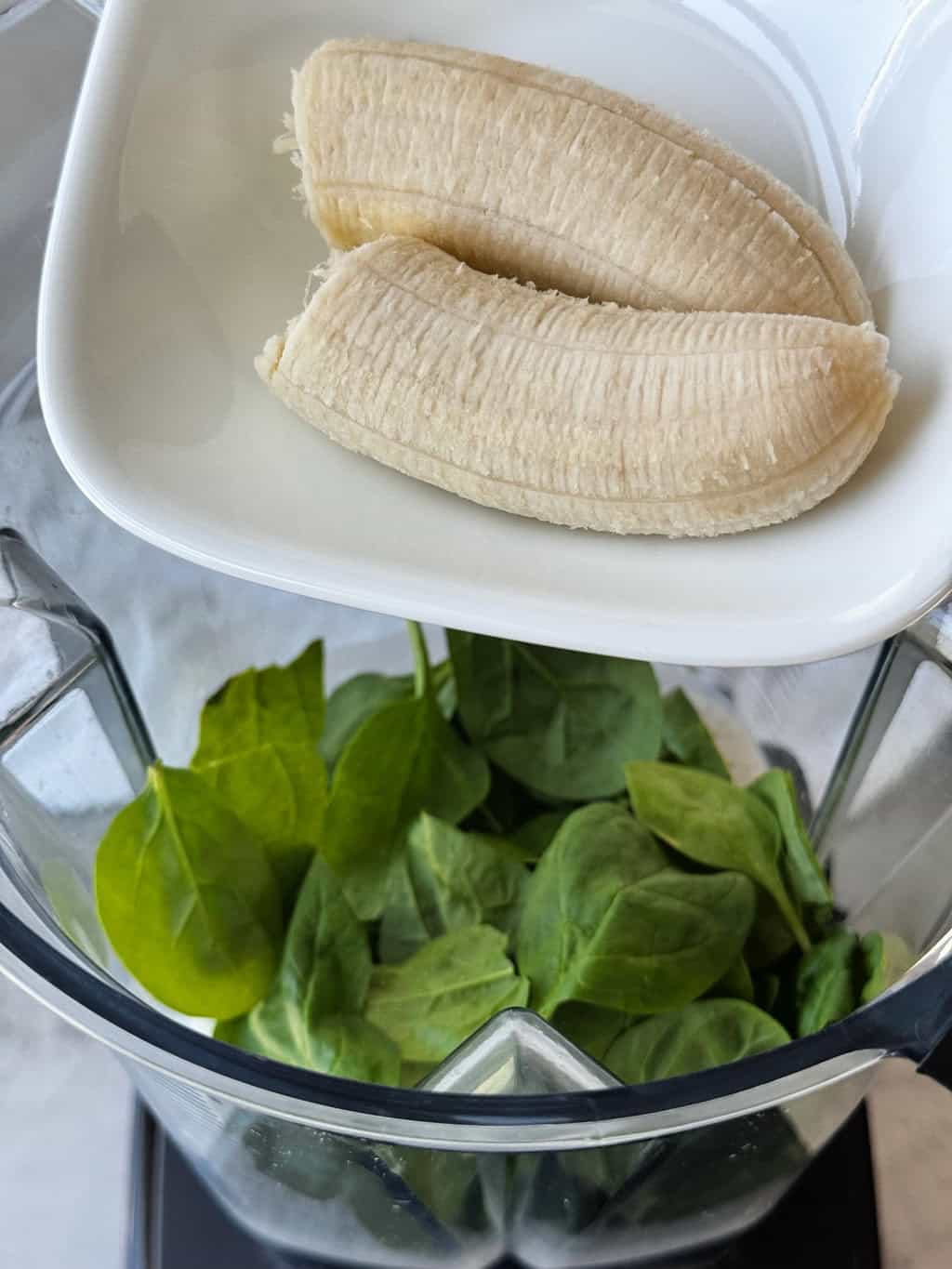 ripe banana in blender for fruit smoothie