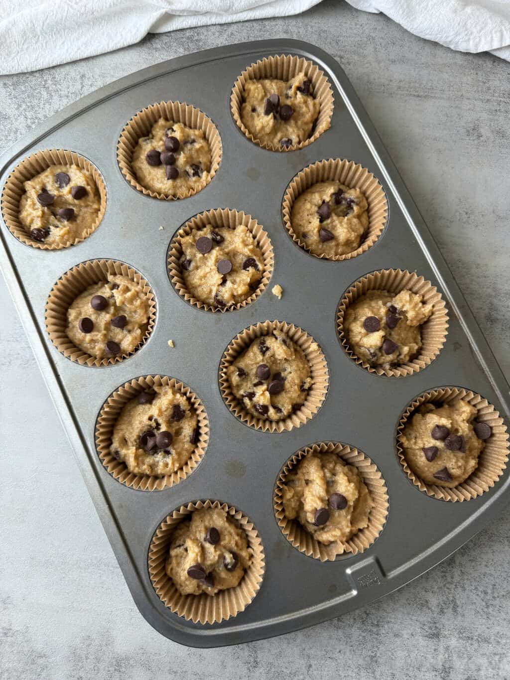 healthy-banana-muffin-batter-in-muffin-tin