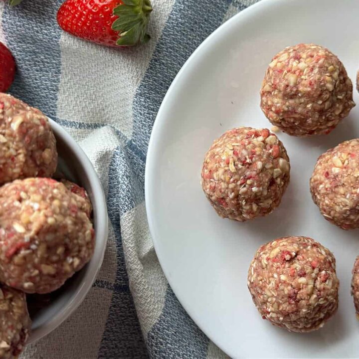 close up healthy strawberry protein balls with cashews oats honey