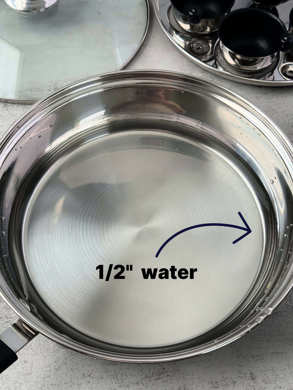 silver pan with water in it