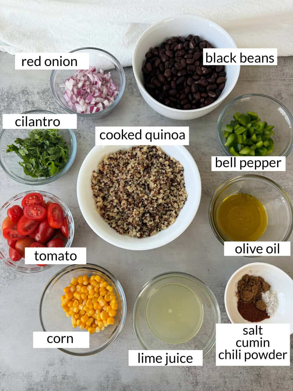 individual ingredients for Black Bean and Quinoa salad wtih labels for each