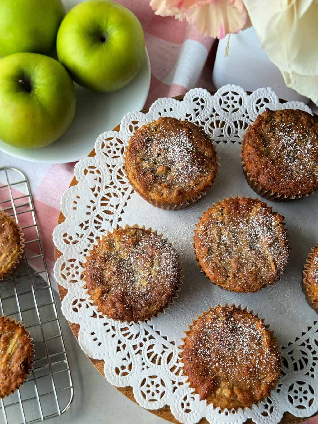 top view of healthy apple muffins with raisins and cinnamon