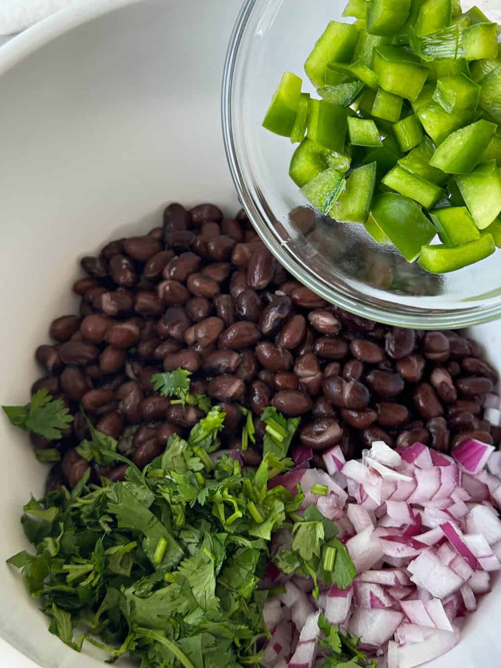 diced green bell pepper to large bowl with other ingredients